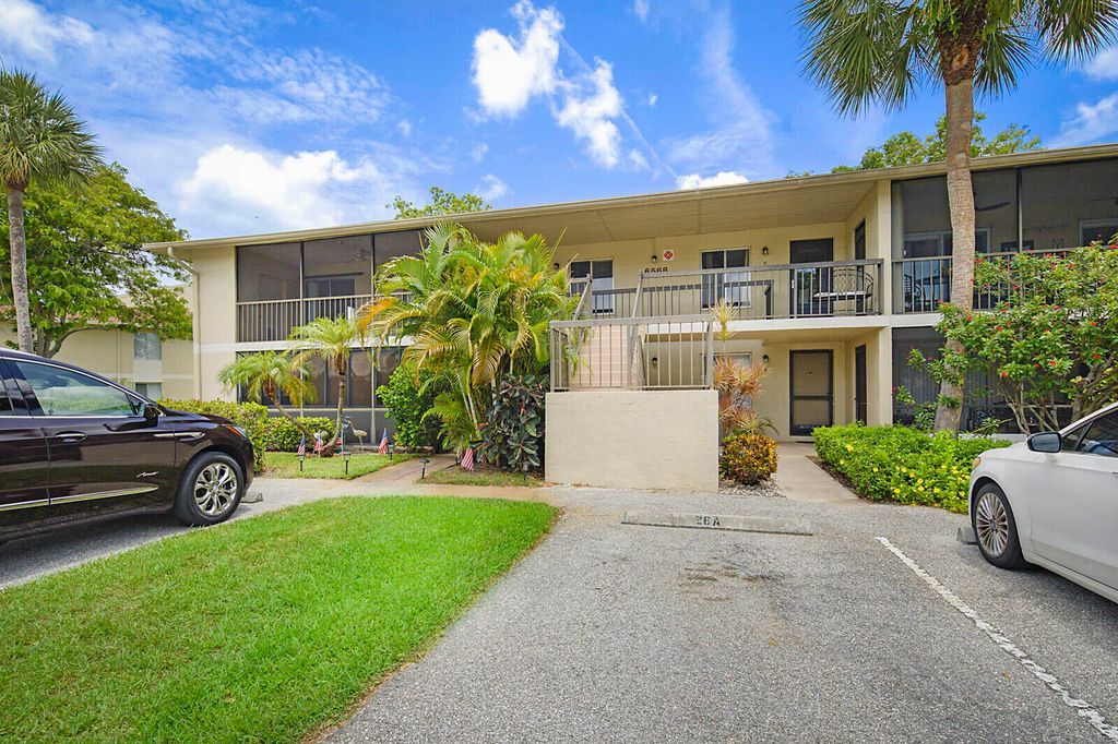 Photo of 6568 Chasewood Drive E #E, Jupiter, FL 33458 (MLS # R11113088)