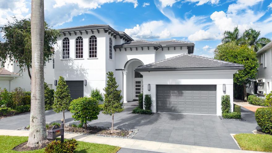 FULL GOLF MEMBERSHIP--Incredible renovated move in ready, 5 bed, 4 full, and 2 1/2 baths, estate home located directly on the golf course, with a rare to find, 3 1/2 car garage. This magnificent home features a new flat tile roof (2024), 2 new A/C units, hurricane impact windows on the upper level, new hurricane impact front door, new appliances, designer kitchen countertops & backsplash, newly renovated primary bathroom with an oversized steam shower, custom light up mirrors with under cabinet lighting, new wood flooring in the office & two main level bedrooms, remote screens for your private outdoor patio overlooking the golf course and pool/spa area, & so much more! This home shows like a model & is move in ready for the upcoming season at the prestigious Addison Reserve Country Club.