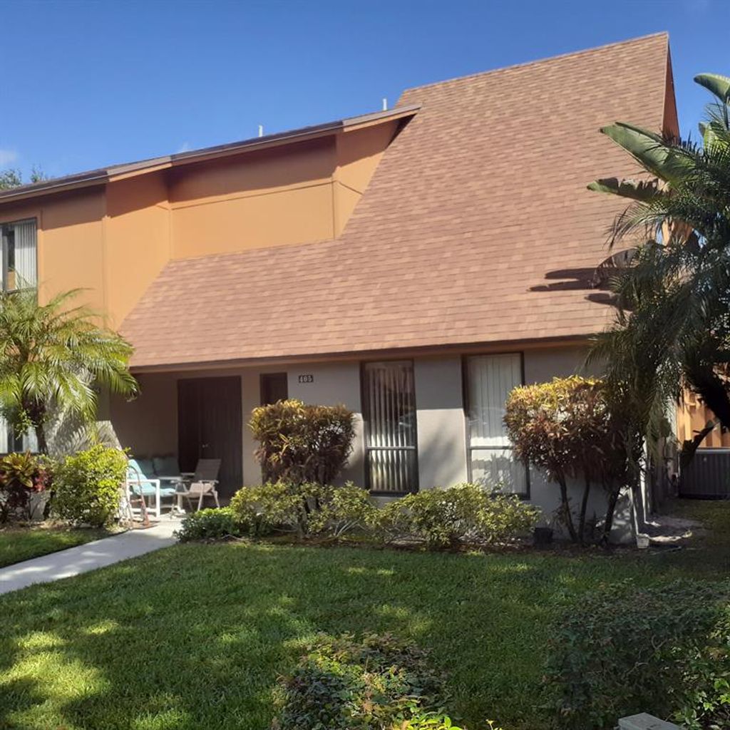 Photo of 405 Sandtree Drive, Palm Beach Gardens, FL 33403 (MLS # R10758035)