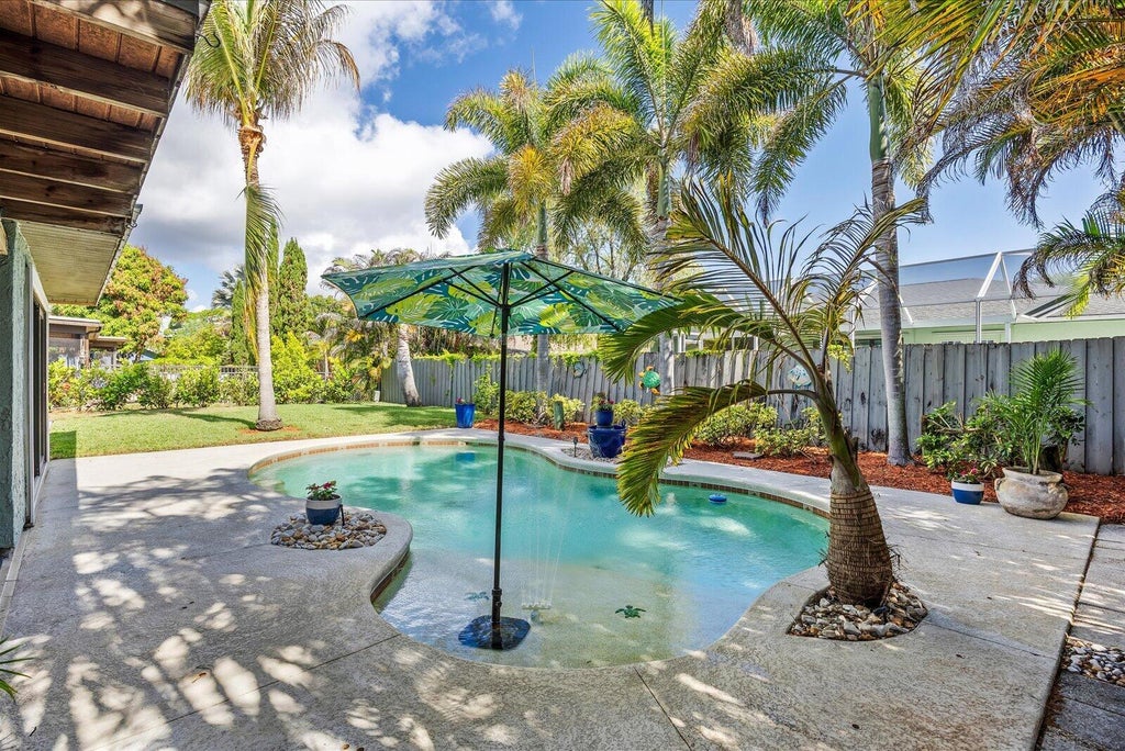 Photo of 687 NE Maranta, Jensen Beach, FL 34957 (MLS # B26040855)