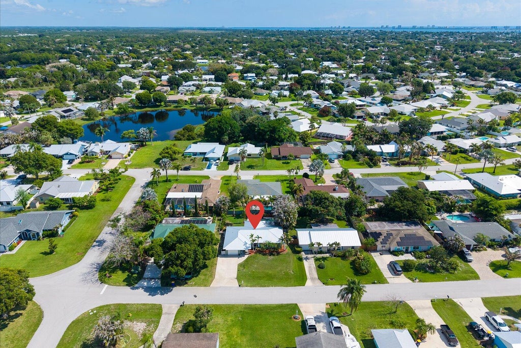 Photo of 687 NE Maranta, Jensen Beach, FL 34957 (MLS # B26040855)