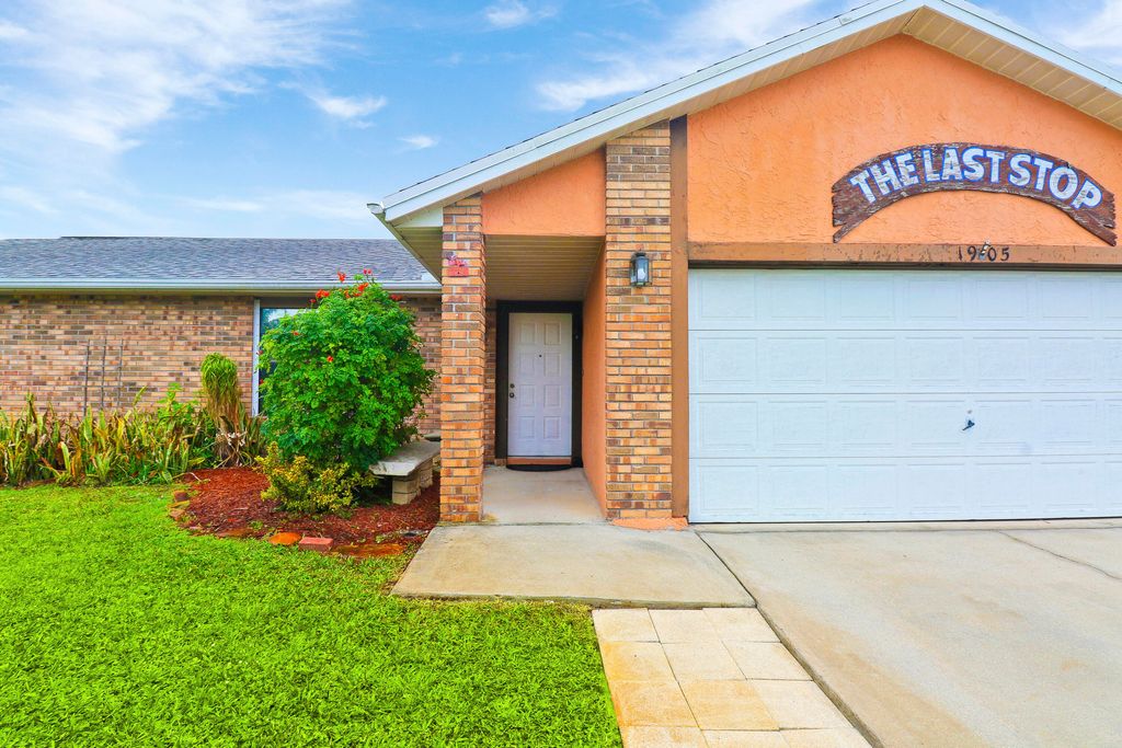 Photo of 1905 SW Idaho Lane, Port Saint Lucie, FL 34953 (MLS # R10950257)