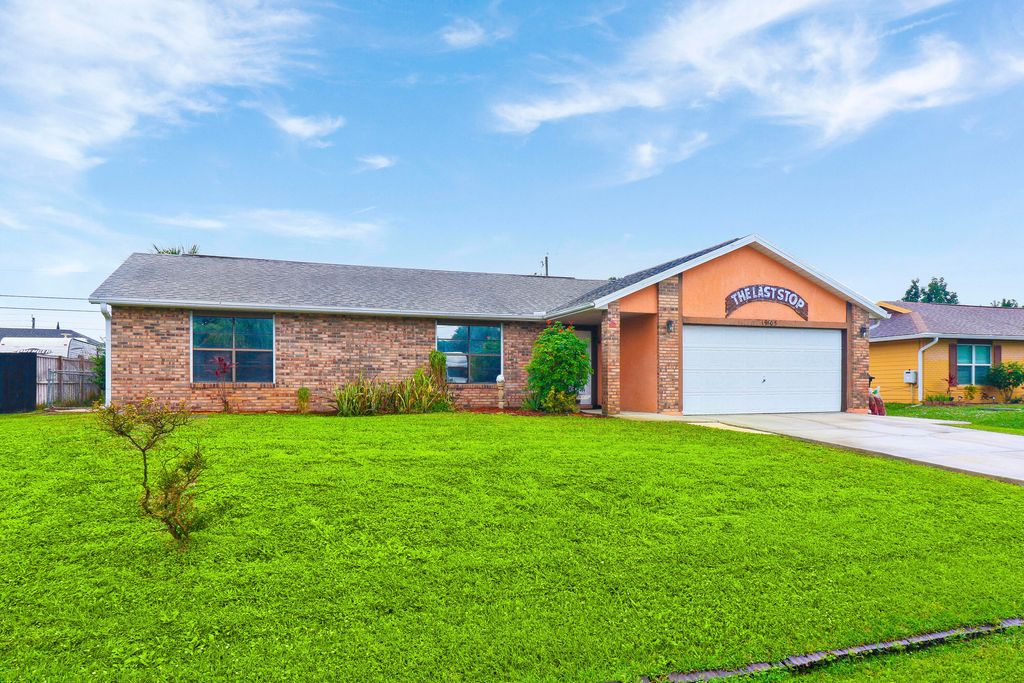 Photo of 1905 SW Idaho Lane, Port Saint Lucie, FL 34953 (MLS # R10950257)