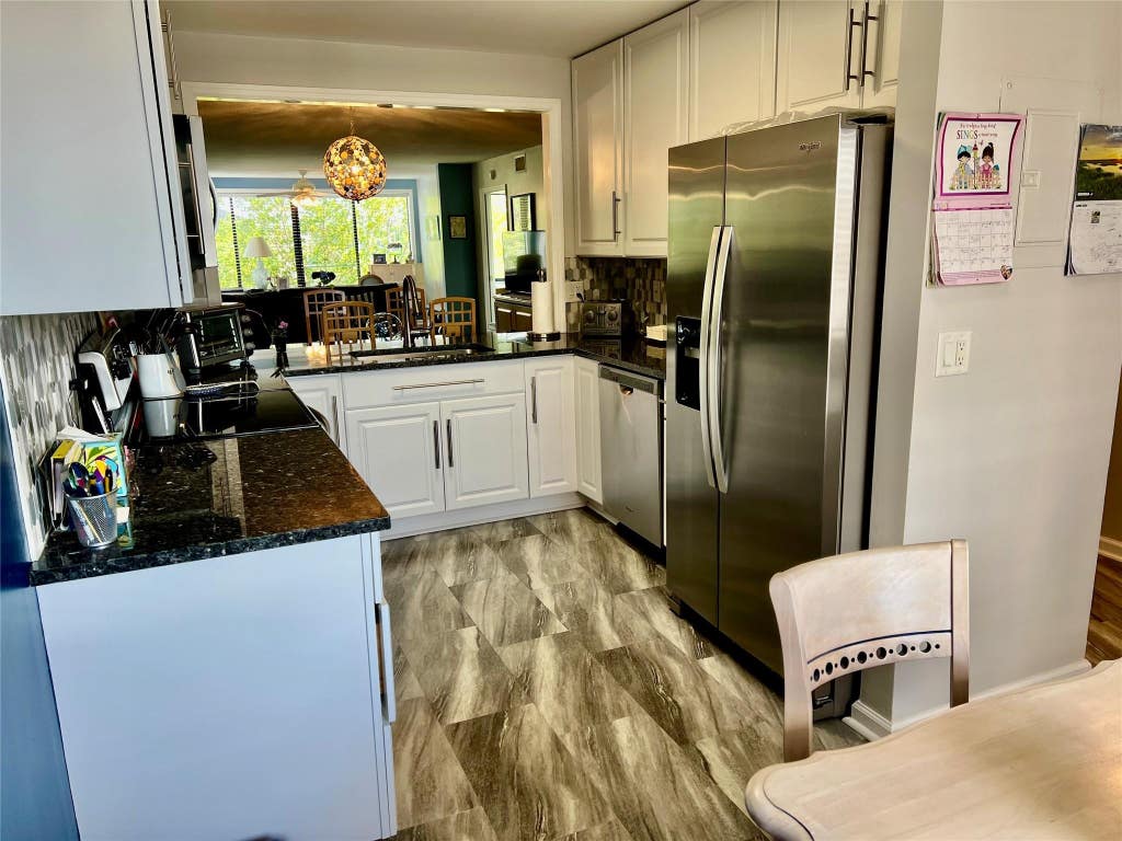 Photo of 9787 N BELFORT Circle #307, Tamarac, FL 33321 (MLS # B26064314)