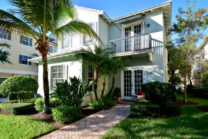 Price Reduced to Sell! Newer built 4 bedroom 3.1 bath Coconut model CBS home in Botanica located in the heart of Jupiter. The home is situated on a lushly landscaped corner lot only steps from pool & park area. This homes first floor features a large living room, great room, kitchen, master suite and powder room. The kitchen features granite countertops, stainless steel appliances, wood cabinetry, under cabinet lighting, island with bar seating and a large pantry. The master bath features dual sinks, separate shower and tub, a linen closet, decorative lighting and wood cabinetry. Beautiful wood stairways leads to the second floor with 3 bedrooms 2 full baths and loft area. Other features include: open balcony, walk-in closets, ceiling fans, covered porch,