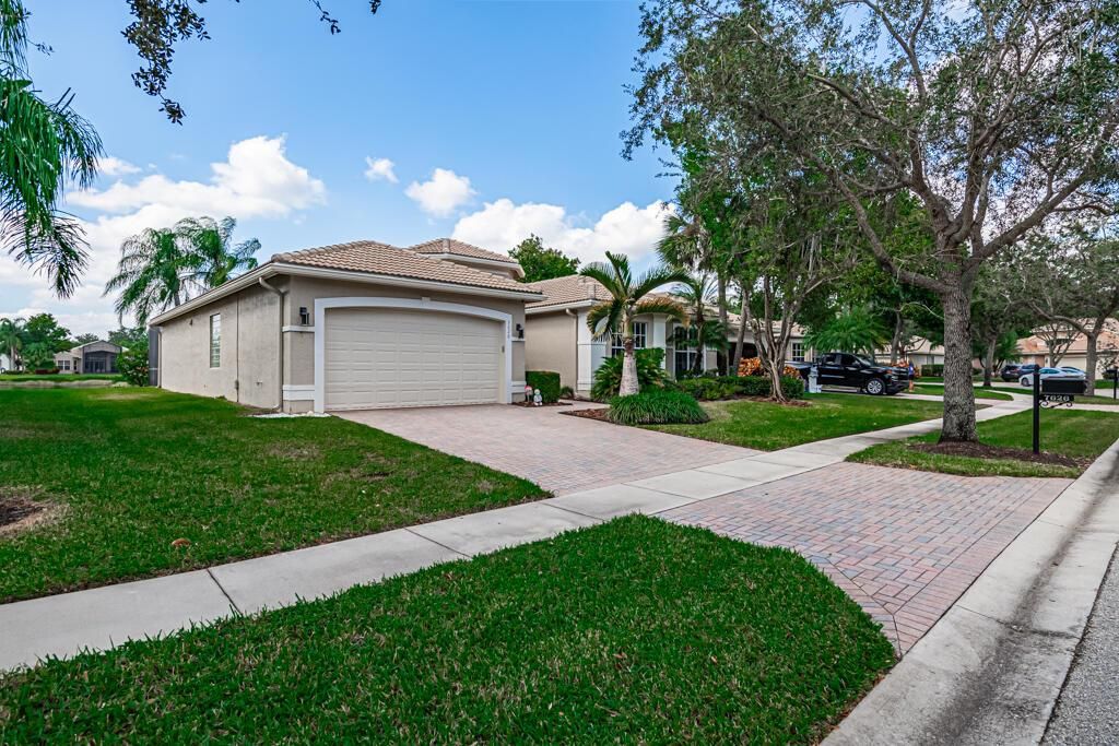 Photo of 7626 Tarpon Cove Circle, Lake Worth, FL 33467 (MLS # R10933007)