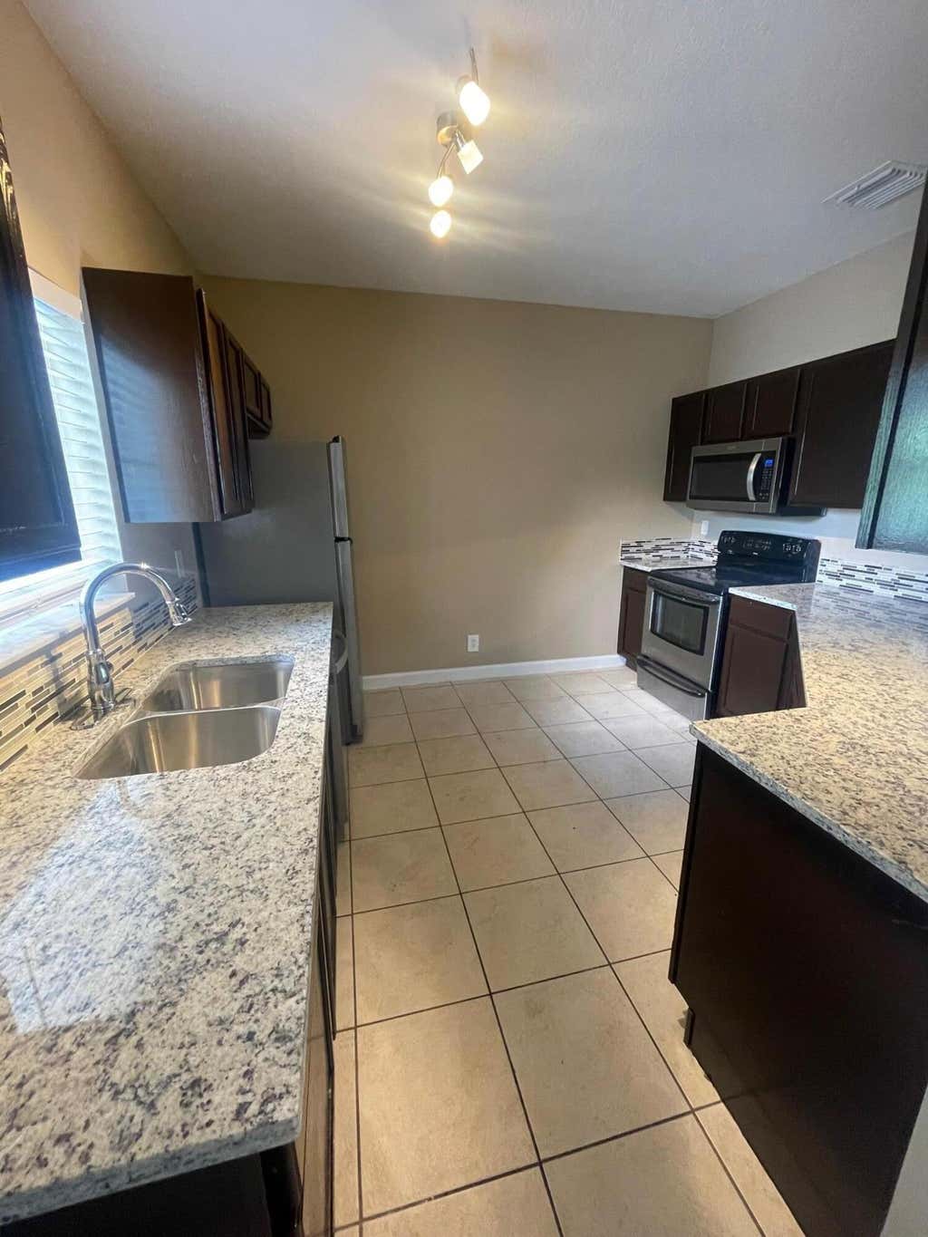 Photo of 1161 Colonial Palms Way, West Palm Beach, FL 33406 (MLS # B26061911)