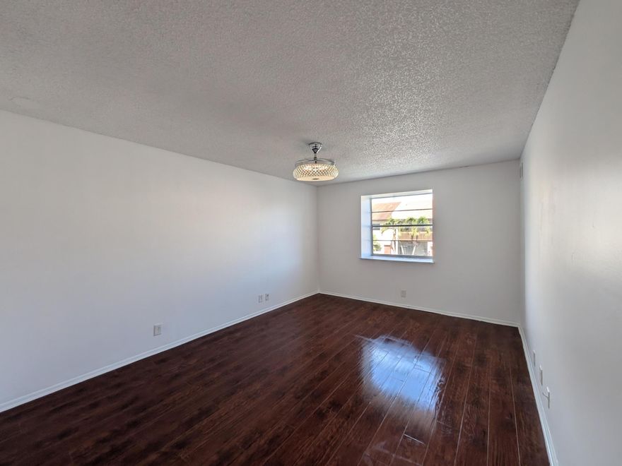 Stop looking for the perfect blend of value and peace of mind—you've found it. This stunning townhome offers the ultimate "worry-free" ownership experience. Say goodbye to high carrying costs with an exceptionally low association fee that incredibly includes water, sewer, and trash.The heavy lifting is already done: a brand-new roof (2026) provides maximum insurance discounts and years of protection. Best of all, because this is a townhome and not a high-rise condo, it is exempt from 40-year recertification requirements—meaning no looming special assessments for structural milestones. Perfect for first-time buyers or savvy investors looking for a high-yield, low-maintenance property.