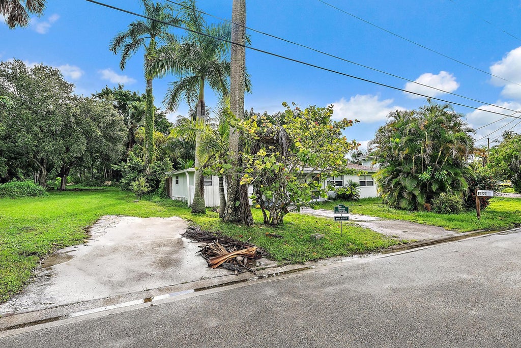 Photo of 1297 NW Charlie Green Drive, Stuart, FL 34994 (MLS # B26078564)