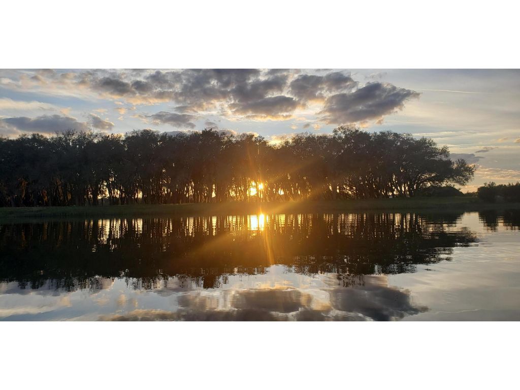 Photo of 6551 SW Pentalago Place, Palm City, FL 34990 (MLS # R11000191)