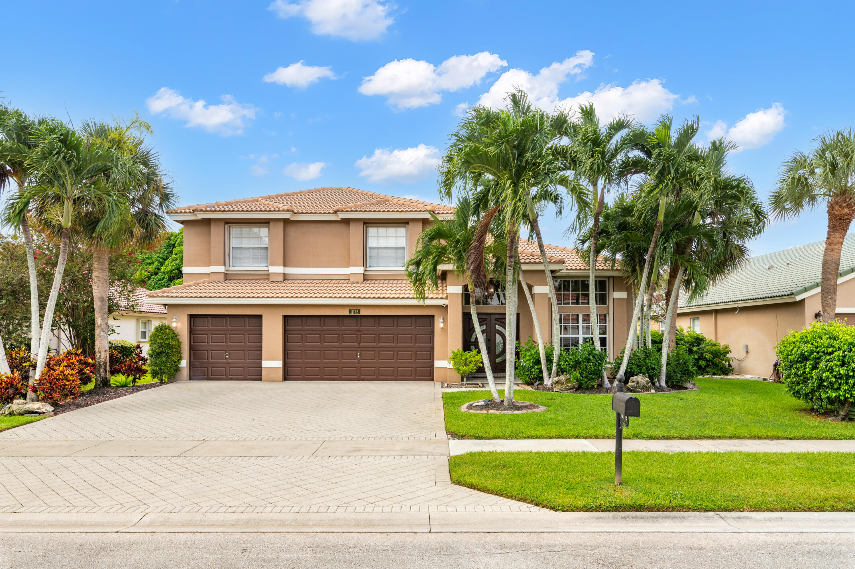 Welcome to the Grand Isles at Wellington! This highly sought-after gated community offers the perfect blend of luxury, convenience, and top-rated schools--all within walking distance.This stunningly beautiful upgraded 2-story home features 4 bedrooms, 2.5 baths, and 2,442 sq ft of spacious living.The First-Floor Master Retreat features a large suite with a huge walk-in closet, dual sinks, soaking tub, and separate shower. Gourmet Kitchen: Granite countertops, center island, wine cooler, stainless steel appliances, abundant high end cabinetry with pull-out pantry drawers, and gas stovetop.Elegant Interiors: Marble flooring in main areas, luxury vinyl in bedrooms and upstairs, soaring cathedral ceilings, and plenty of natural