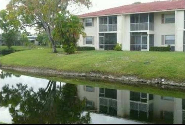 Location! Location! Location! Holiday Village Borders the Active and Newly Built Coral Springs Downtown Revitalizaton Area. Walk to Coffee Shops, Resturants and Shopping. Close Access to Major Highways. First Floor Updated 1 Bedroom with 1 Full Bath and a Half Bath. Tiled Flooring Throughout, Peaceful Backyard Views and Covered Patio. Washer and Dryer in Unit. Parking Spot and Guest Parking Available. Community Pool on Location.