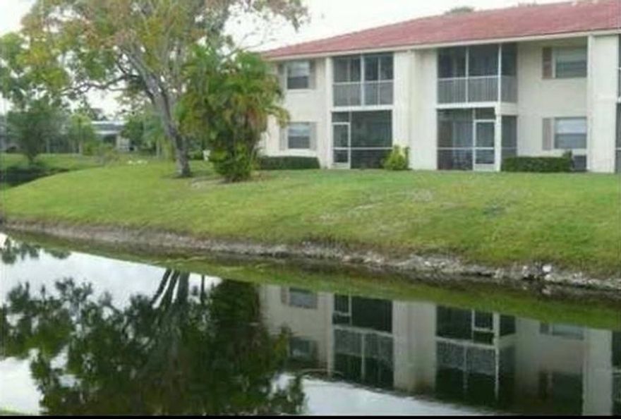 Location! Location! Location! Holiday Village Borders the Active and Newly Built Coral Springs Downtown Revitalizaton Area. Walk to Coffee Shops, Resturants and Shopping. Close Access to Major Highways. First Floor Updated 1 Bedroom with 1 Full Bath and a Half Bath.  Tiled Flooring Throughout, Peaceful Backyard Views and Covered Patio. Washer and Dryer in Unit. Parking Spot and Guest Parking Available.  Community Pool on Location.