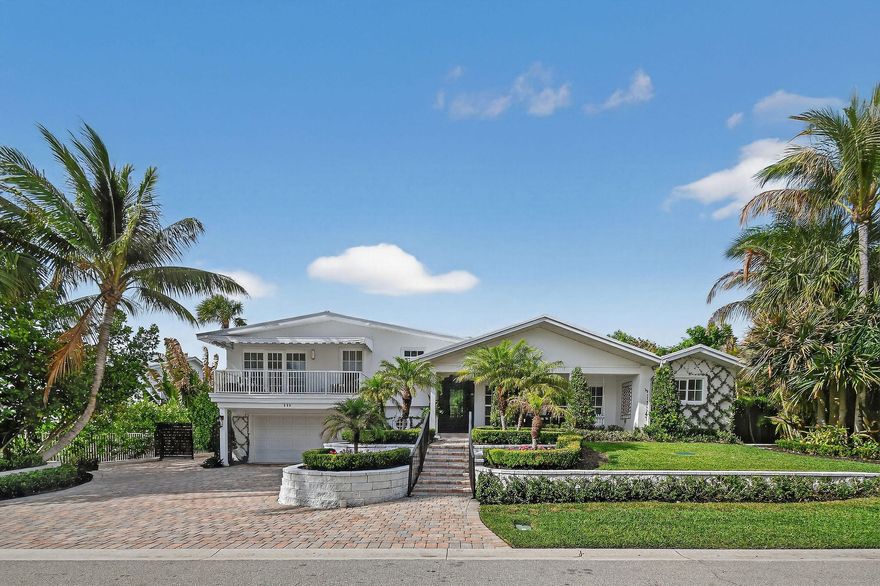 Tucked within the exclusive seaside community of Jupiter Inlet Colony at the southern tip of Jupiter Island, this fully renovated 4 bedroom, 4 bath home offers a blend of privacy, style, and effortless coastal living. Known for its quiet streets, private beach access, and dedicated police department, Jupiter Inlet Colony remains one of South Florida's most sought after enclaves. Fully renovated in 2024, the home is set on an elevated 10,450 square foot lot with no rear neighbors, surrounded by lush tropical landscaping and classic Palm Beach style espalier trellis walls. Its central in-town location places you just moments from both beach paths, making easy access to the ocean part of everyday life. Inside, a bright and open layout is enhanced by vaulted ceilings with exposed beams  and natural light flowing in from both sides. Impact rated windows and doors provide comfort and peace of mind, while the design balances a relaxed coastal feel with a clean, sophisticated finish. The outdoor setting is designed for both entertaining and quiet enjoyment, with a private pool and serene backdrop. Ample parking for up to seven vehicles offers added convenience for hosting guests. A stunning, move in ready residence in one of Jupiter's most desirable coastal communities.