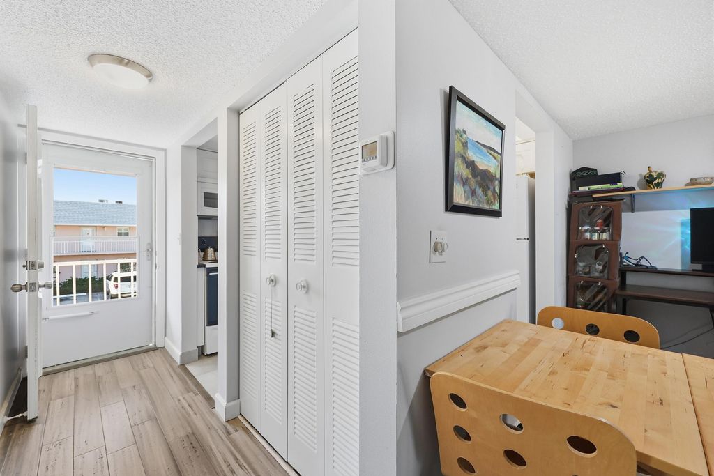 Photo of 18081 SE Country Club Drive #6-60, Jupiter, FL 33469 (MLS # R11162856)