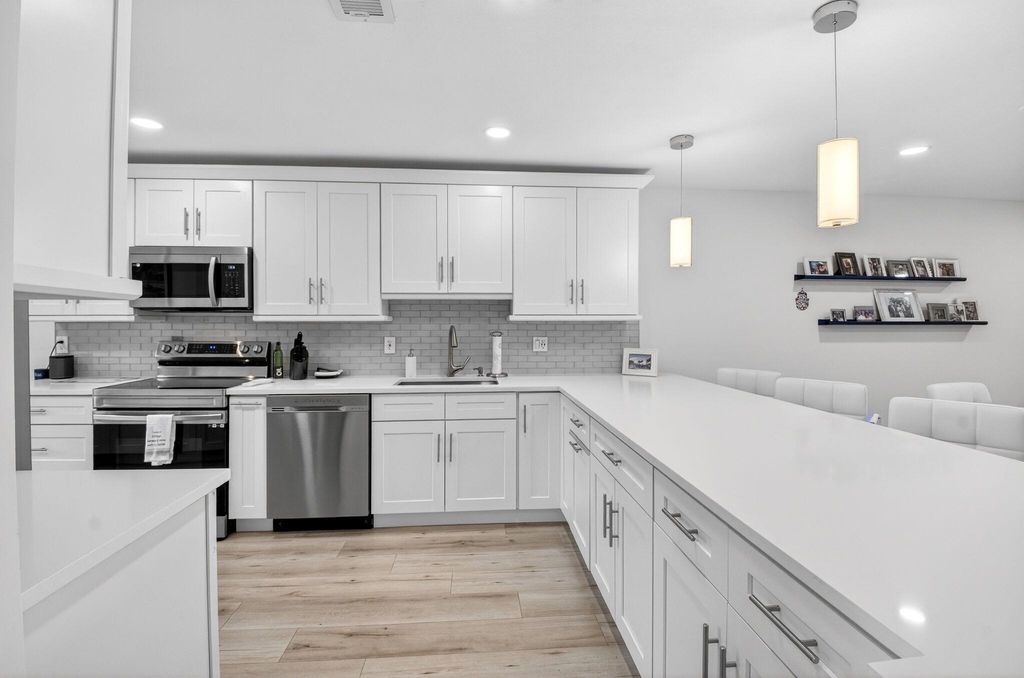 Photo of 18 Westgate Lane #E, Boynton Beach, FL 33436 (MLS # R11149558)