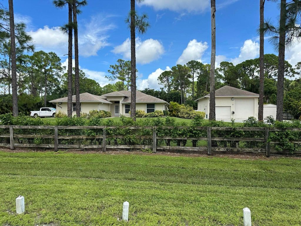 Photo of 16193 72nd Road N, The Acreage, FL 33470 (MLS # R11138099)