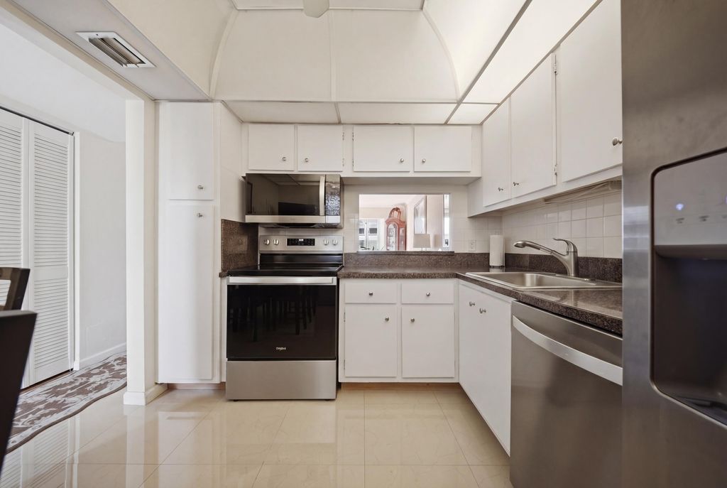 Photo of 3040 Holiday Springs Boulevard #212, Margate, FL 33063 (MLS # B26015852)