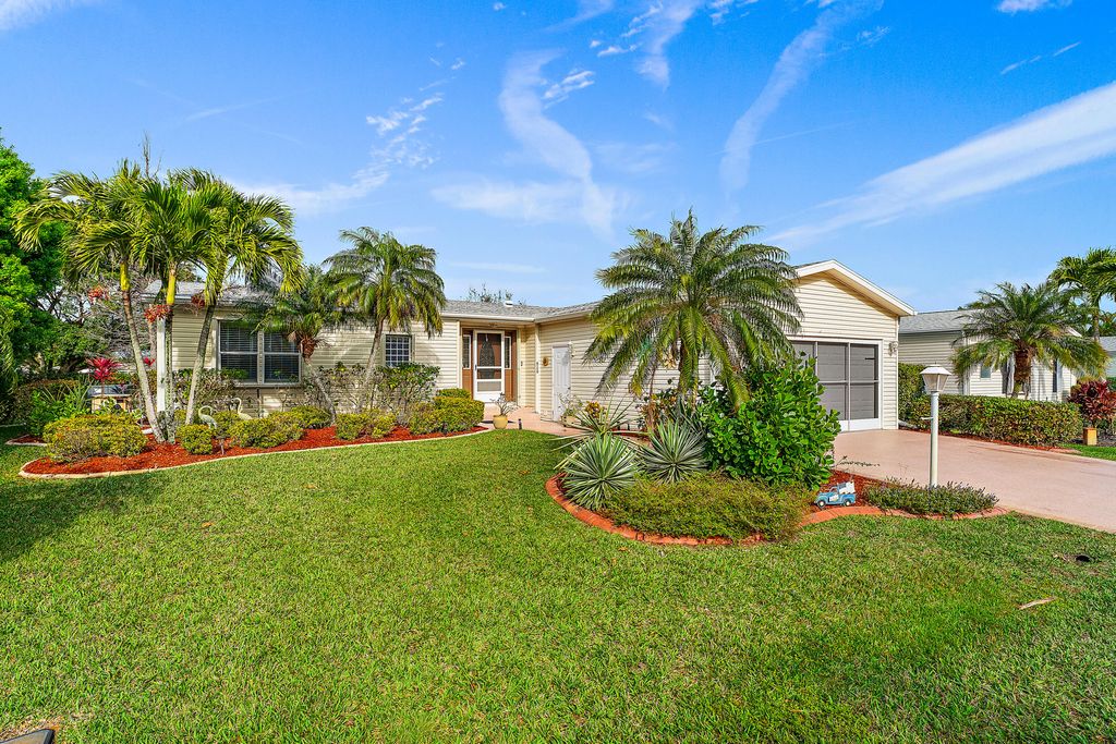 Photo of 8150 13th Hole Drive, Port Saint Lucie, FL 34952 (MLS # R10967063)