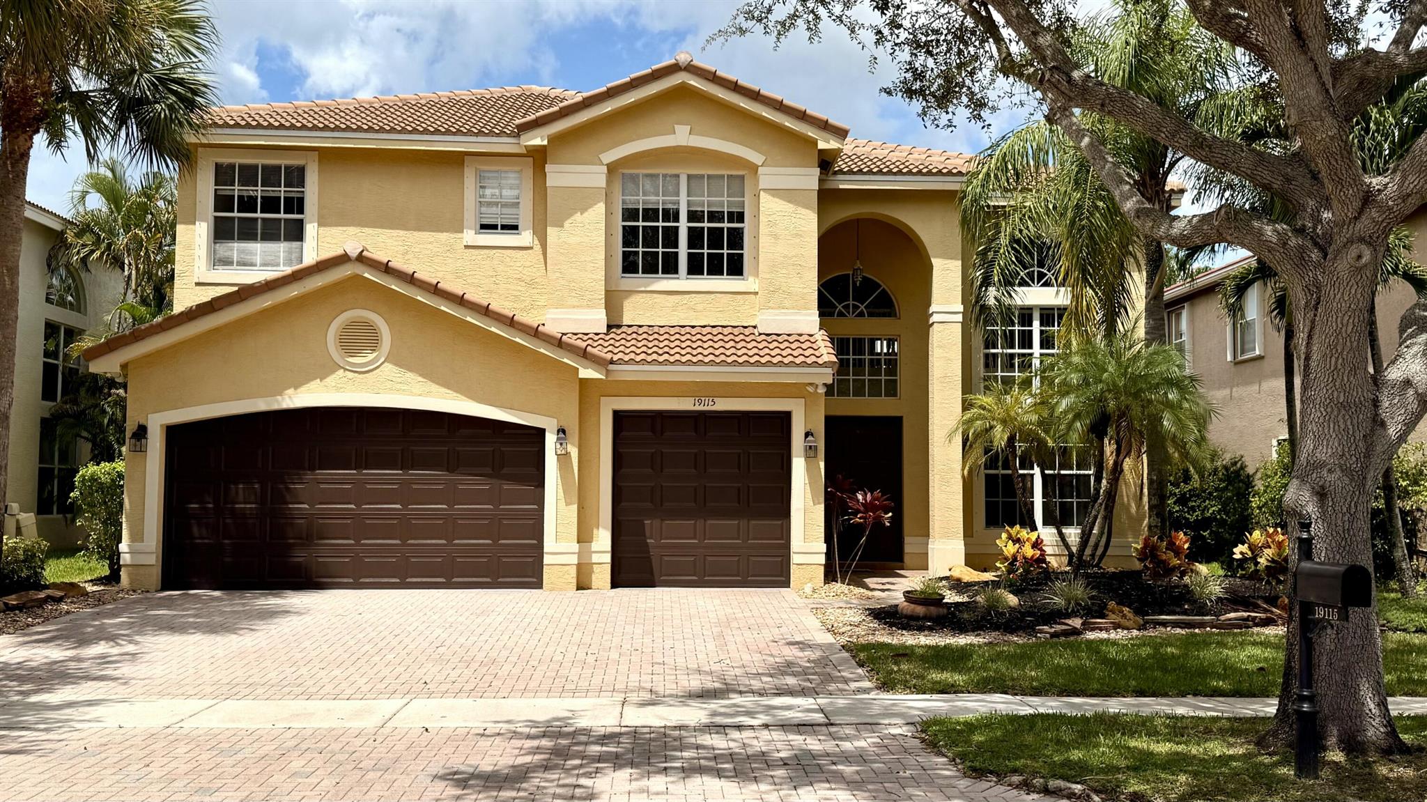 Serene 2-story 5/3 with lower level bedroom, 3 car garage lake home in manned, gated community, offering 18'' marble flooring, high ceilings, new roof, newer kitchen, upgraded master bath vanities . Kitchen has granite, large center island and breakfast area overlooking the lake. Oversized primary bedroom on second floor with picturesque lake views, and large walk-in his and her closets. Second floor also boasts a huge family room/bonus loft living area. This home has a grand outside patio space for entertaining, with built in granite wet bar that can accommodate all your guests, surrounded by professionally landscaped gardens. Clubhouse is only steps away and offers pool, hot tub, gym, sauna, tennis, basketball, and tot lot.