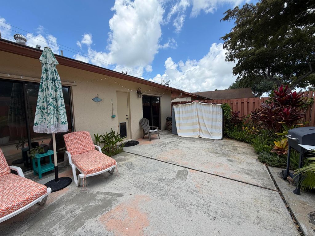 Photo of 1051 Summit Place Circle #D, West Palm Beach, FL 33415 (MLS # B26029517)