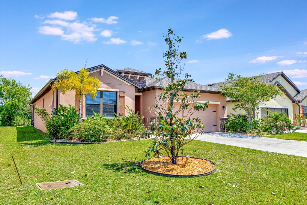 Photo of 6449 NW Castlebrook Avenue, Port Saint Lucie, FL 34983 (MLS # R11085878)