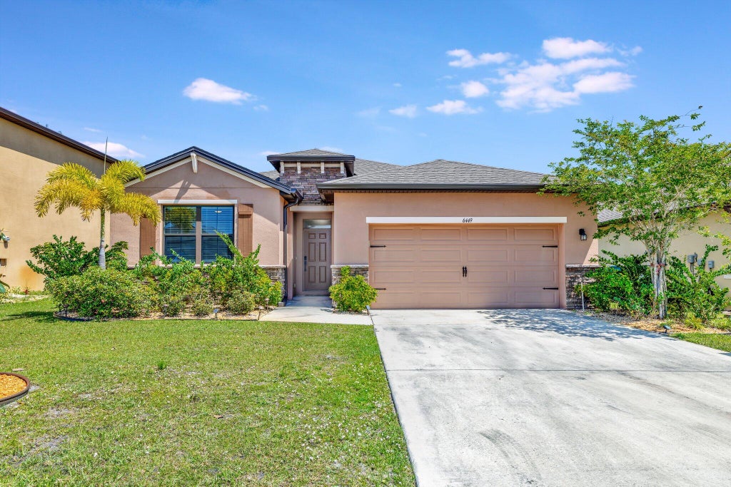 Photo of 6449 NW Castlebrook Avenue, Port Saint Lucie, FL 34983 (MLS # R11085878)