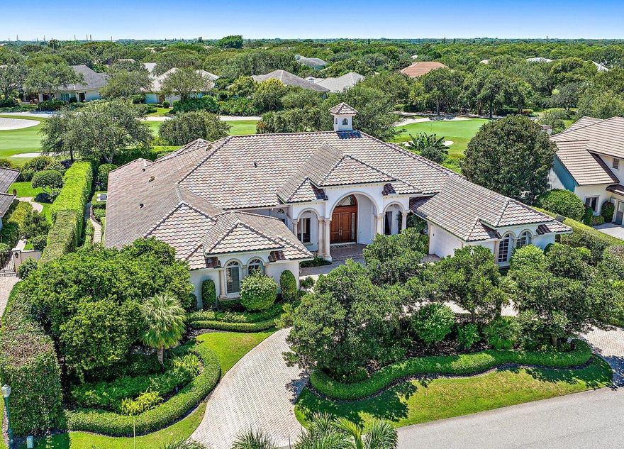 This spacious and beautifully appointed home located on the 16th hole of the Village Course at prestigious Jupiter Hills presents an opportunity to have that family compound you have been waiting for.  Enter a light filled formal living room that overlooks the beautifully landscaped pool and summer kitchen. The large kitchen-family room and adjacent theatre room will keep your family and friends entertained and happy.  A fully equipped theater room, and sumptuous paneled office complete the picture. The beautiful and calming master suite is the perfect place to begin and end the day. Three additional family bedrooms with ensuite baths and two powder rooms make this family home perfect for entertaining.
