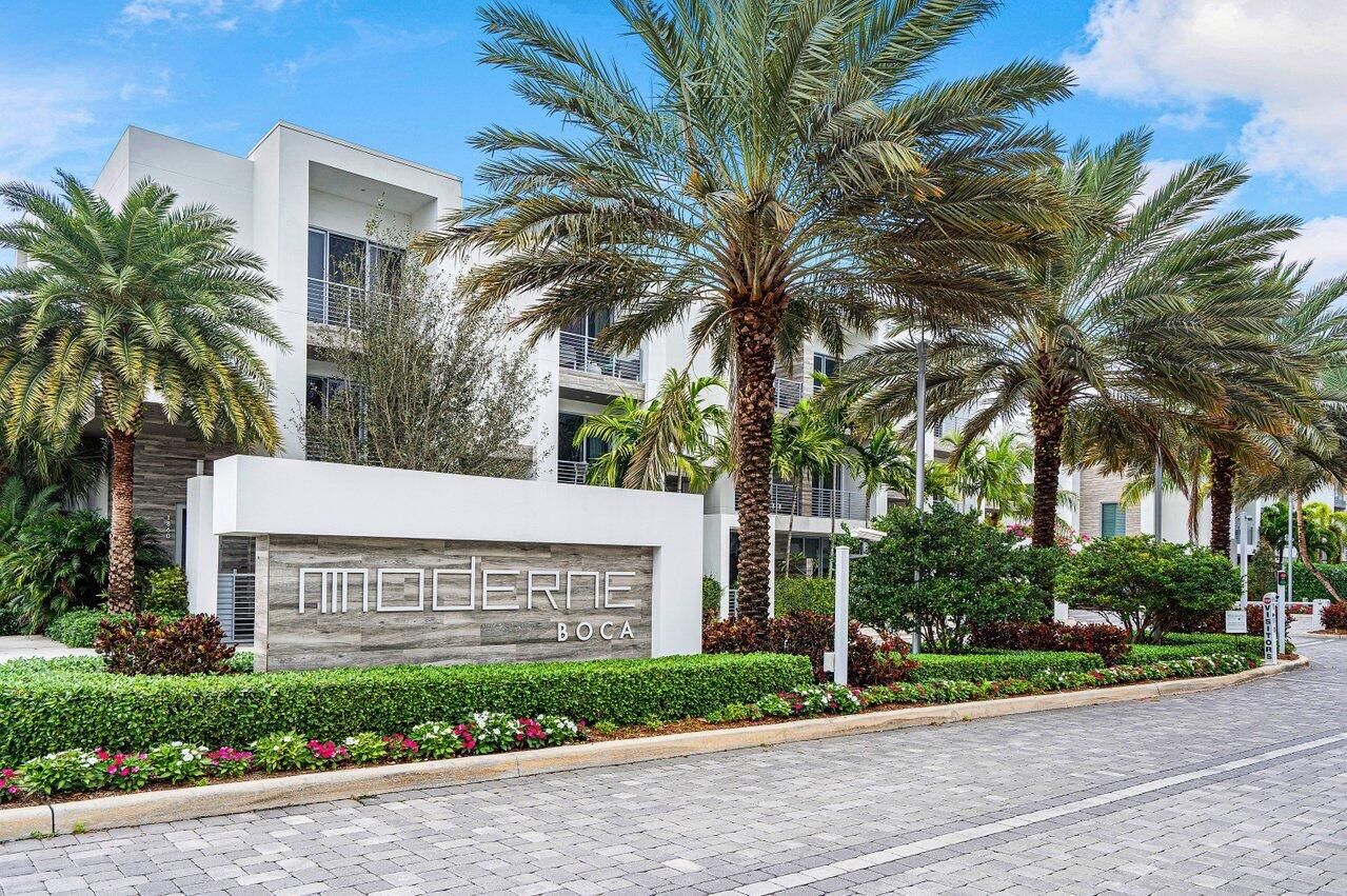 Experience the ultimate in modern luxury living at Moderne, Boca Raton's exclusive gated community of just 75 contemporary residences. Perfectly situated in the heart of Central Boca, this 3-story corner townhome offers extra windows, sleek architecture & resort-style amenities. Minutes from Town Center Mall, Mizner Park, pristine beaches, and top-rated schools. Built in 2018, this rare residence features soaring 10' ceilings, expansive impact windows, and an open-concept design that seamlessly connects the living, dining, and gourmet kitchen areas. The chef's kitchen is equipped with premium stainless steel appliances, European cabinetry, quartz countertops, and an oversized island ideal for entertaining. 2 spacious bedrooms, 3.5 baths, and a versatile first-floor suite or office.