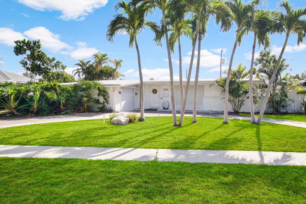 Photo of 720 Eastwind Drive, North Palm Beach, FL 33408 (MLS # R10829671)