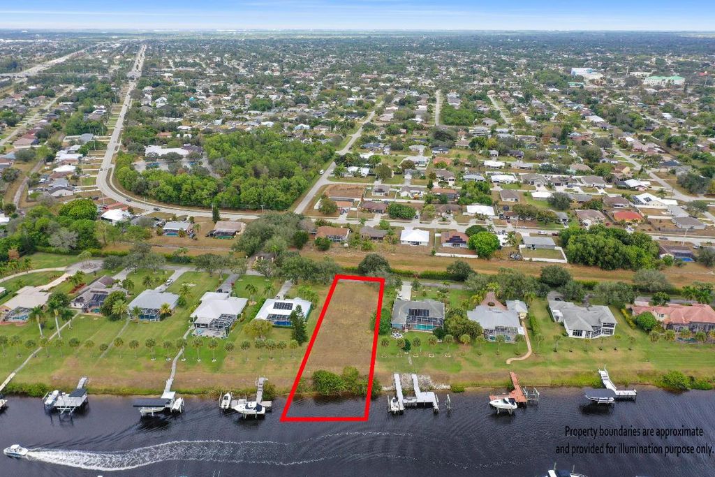 Photo of 2606 SW River Shore Drive, Port Saint Lucie, FL 34984 (MLS # R11155186)