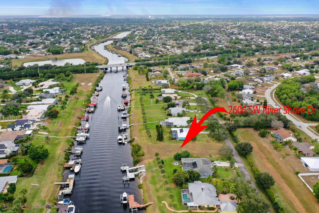 Photo of 2606 SW River Shore Drive, Port Saint Lucie, FL 34984 (MLS # R11155186)