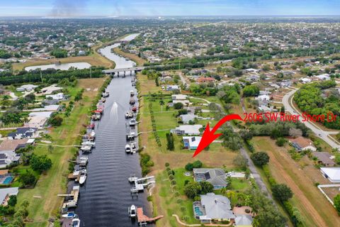 Photo of 2606 SW River Shore Drive, Port Saint Lucie, FL 34984 (MLS # R11155186)