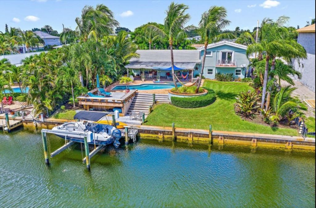 Photo of 724 Kittyhawk Way, North Palm Beach, FL 33408 (MLS # R10945693)