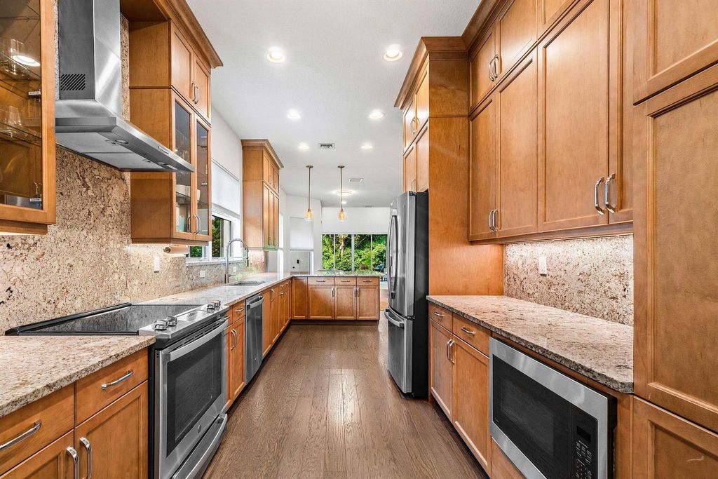 Photo of 11401 Pointe Midtown Drive, Palm Beach Gardens, FL 33418 (MLS # R11118733)