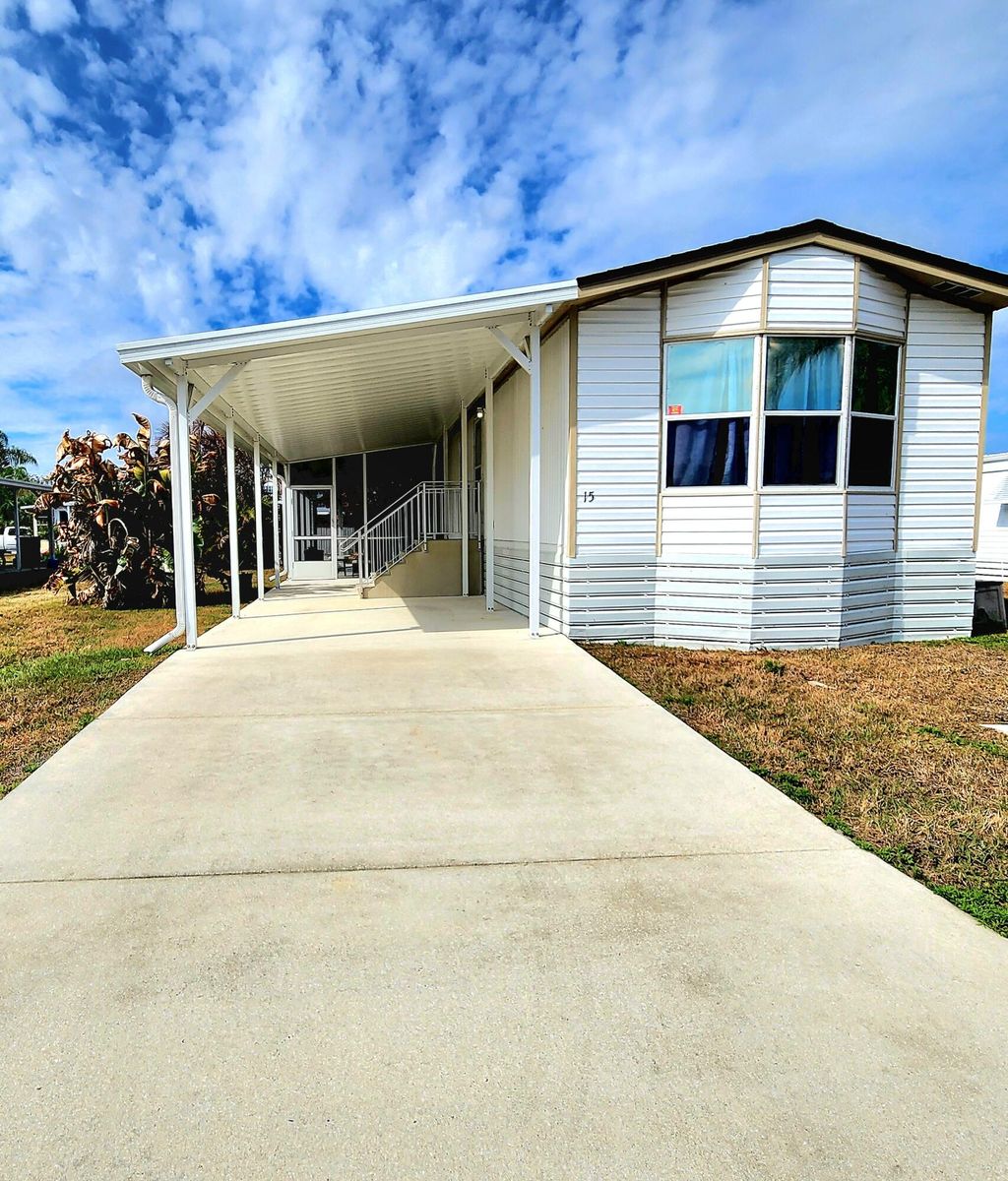 Photo of 15 Alta Loma, Port Saint Lucie, FL 34952 (MLS # R11168456)