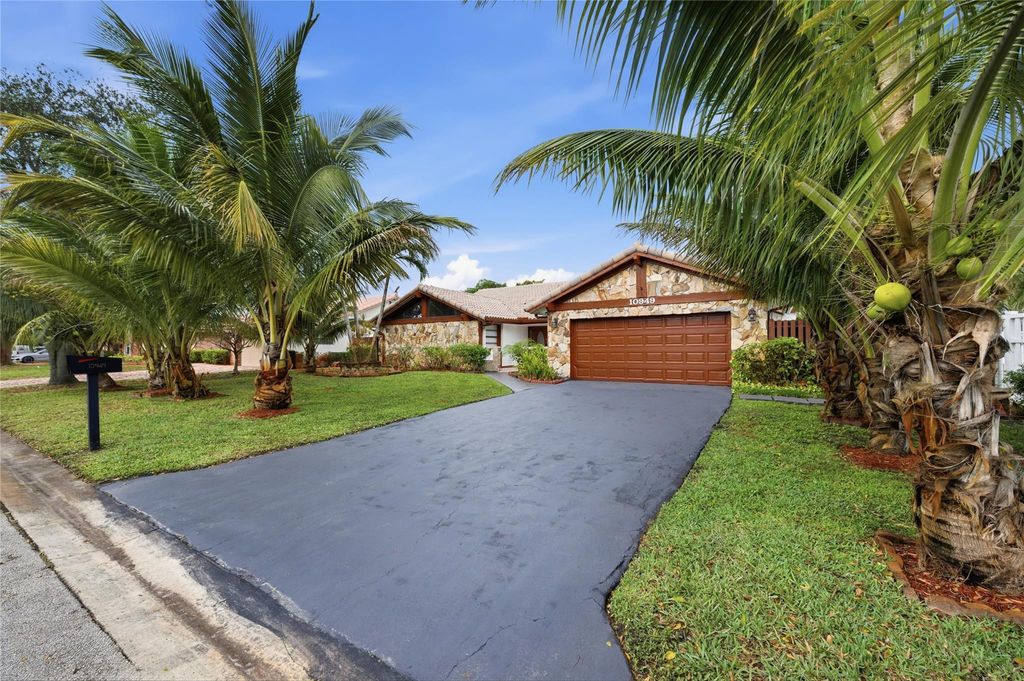 Photo of 10949 NW 1st Manor, Coral Springs, FL 33071 (MLS # B26032864)