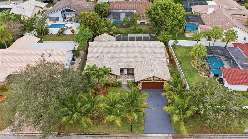 Photo of 10949 NW 1st Manor, Coral Springs, FL 33071 (MLS # B26032864)