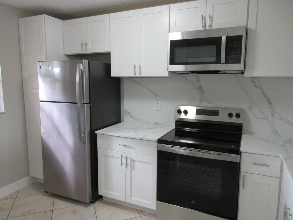 Photo of 4111 NW 114th Avenue, Coral Springs, FL 33065 (MLS # B26009572)