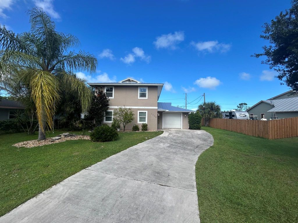 Photo of 5006 Sunset Boulevard, Fort Pierce, FL 34982 (MLS # R11013513)