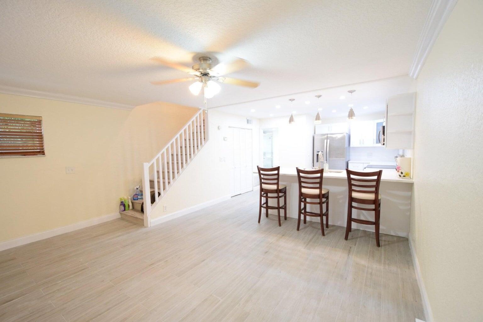 LOCATION LOCATION!Totally redone 2 bedroom 2 bathroom in a tranquil private setting. Beautiful new kitchen, new flooring throughout, updated bathrooms. Washer and dryer inside. shared pool.Bike to the beach and Linton blvd.Two spots for parking.*No Smoking*