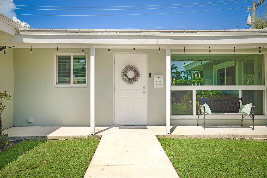 Photo of 711 NW 7th Drive, Boca Raton, FL 33486 (MLS # R11145574)