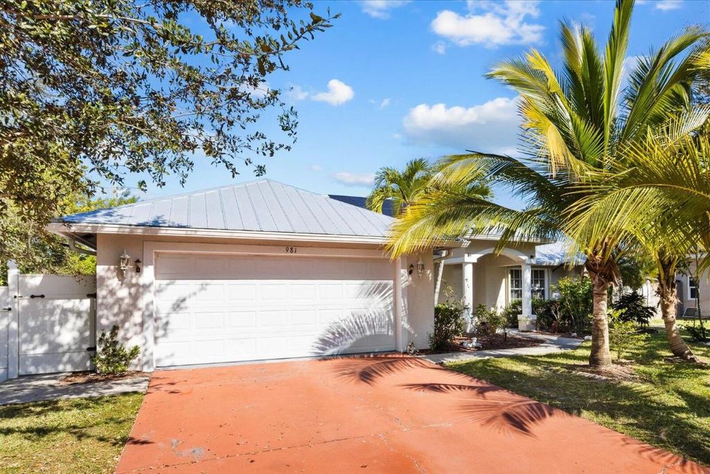 Photo of 981 SW Mccracken Ave, Port Saint Lucie, FL 34953 (MLS # R11141329)