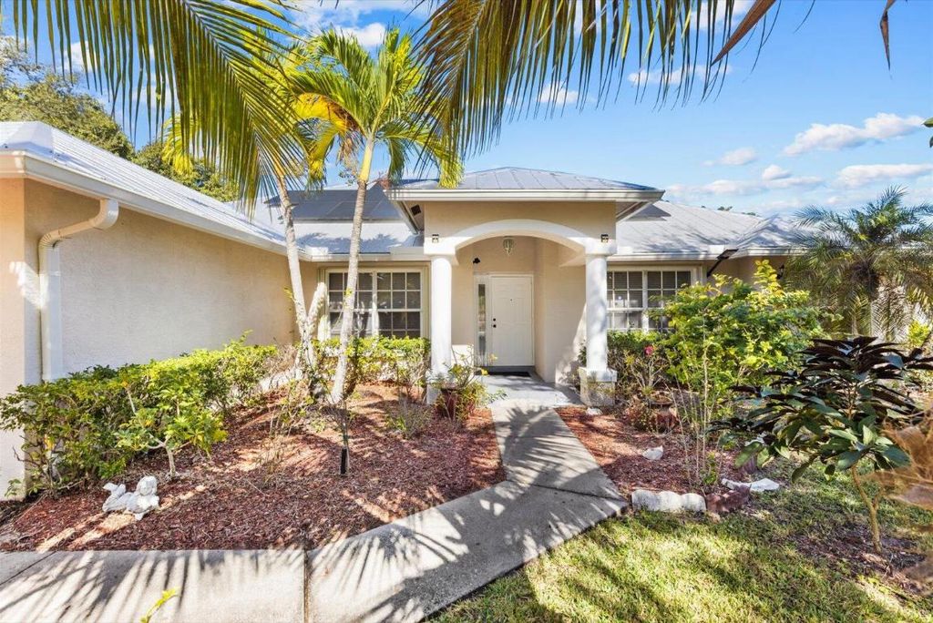 Photo of 981 SW Mccracken Ave, Port Saint Lucie, FL 34953 (MLS # R11141329)