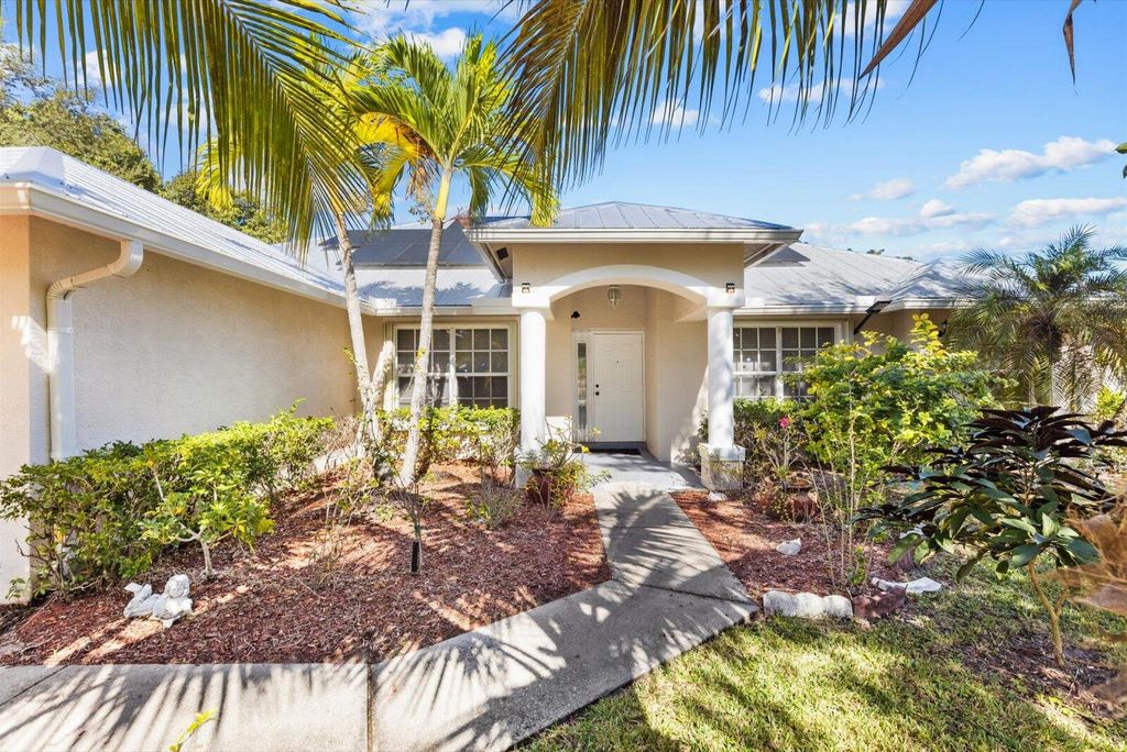 Photo of 981 SW Mccracken Ave, Port Saint Lucie, FL 34953 (MLS # R11141329)