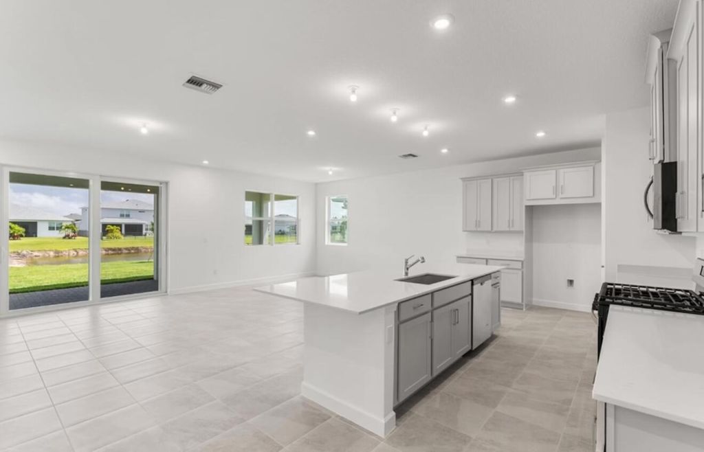 Photo of 10207 SW Adelaide Terrace, Port Saint Lucie, FL 34987 (MLS # R11119302)