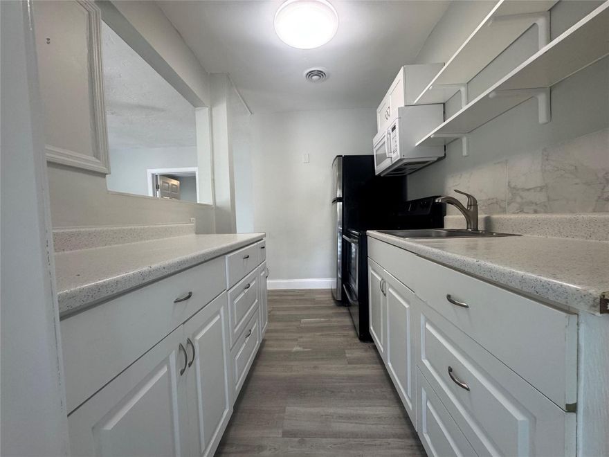 All utilities included! This fully remodeled garden-level unit offers modern finishes, a large walk-in closet, and is nestled in the heart of Victoria Park. Set within a peaceful community with a sparkling pool — an ideal place to call home