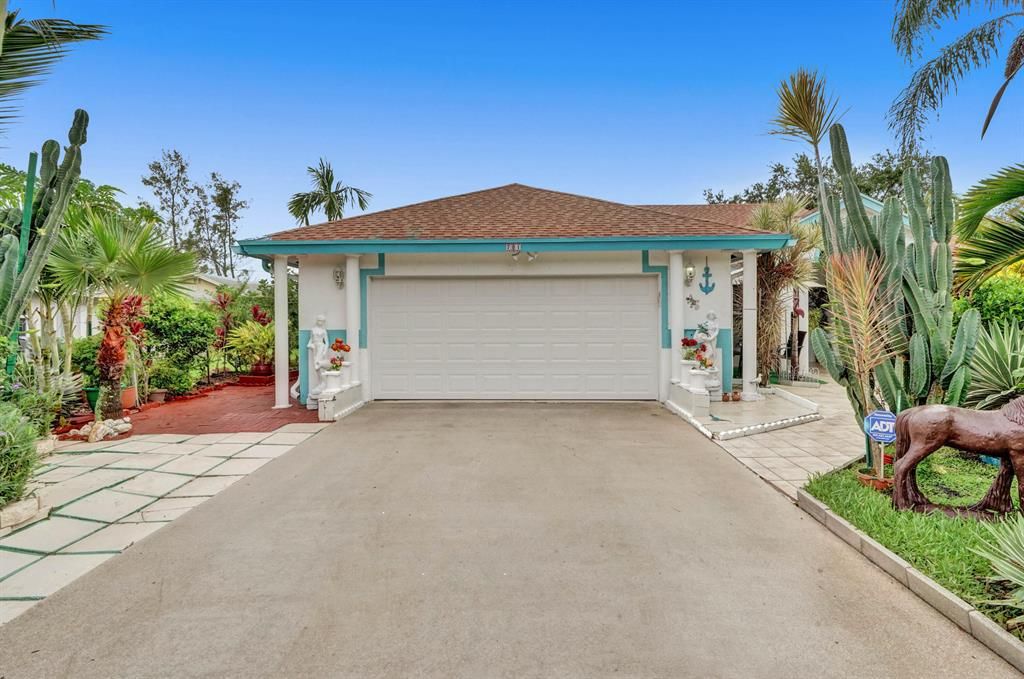 Photo of 701 Birdie Court, Delray Beach, FL 33445 (MLS # R10724969)