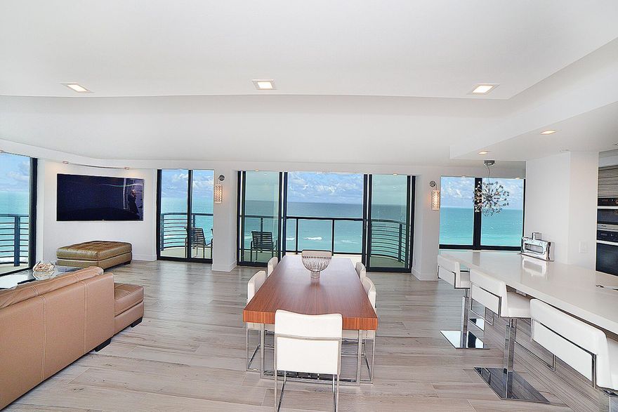 This Ultra-Luxurious, Fully Renovated High-Floor Corner Residence Epitomizes Modern Sophistication with Chic, Clean Lines & Breathtaking, Unobstructed 270 Views. Enjoy Stunning Panoramas of the Atlantic Ocean to the East, the Northern Coastline, and Expansive Vistas of Lake Boca and Sunsets to the West. Rarely Available, this North Corner Residence Features Private Extraordinary Outdoor Terraces to the North, West and East. Boasting 2 Bedrooms, 2.5 Baths, and Designer Finishes Throughout, the Residence Offers High-End Appliances, Custom Fixtures, and Meticulous Attention to Detail. Complete with New Electrical, Plumbing, and Sheetrock, This Home Also Includes a Garage Underground Parking Space. Perfectly Tailored for the Most Discerning Clientele.