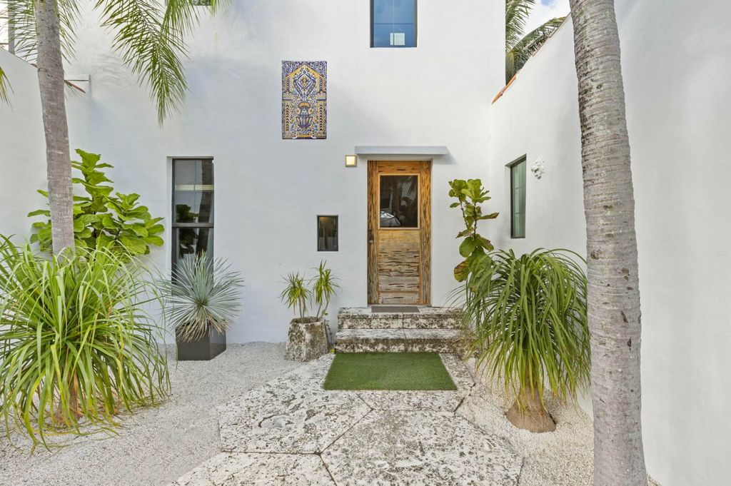 Photo of 231 Lytton Court, West Palm Beach, FL 33405 (MLS # R11040135)